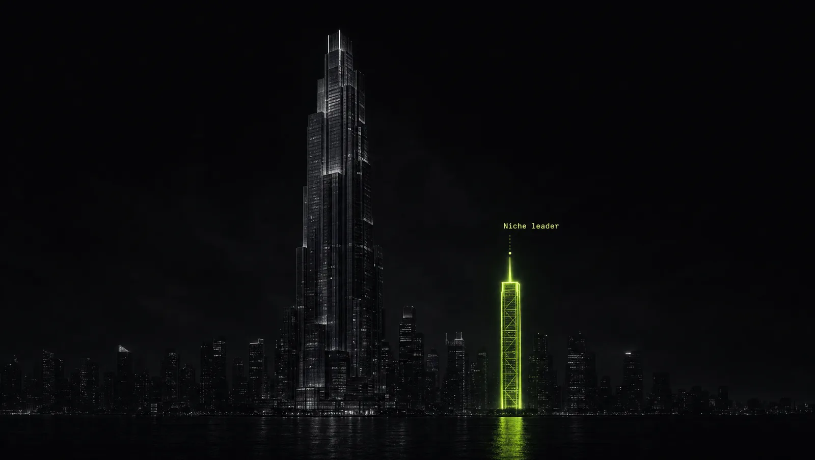 A small lime-lit tower standing apart from a giant grey skyscraper at night: a focused challenger next to an incumbent